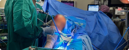 Dr. Varkey performs a knee operation.